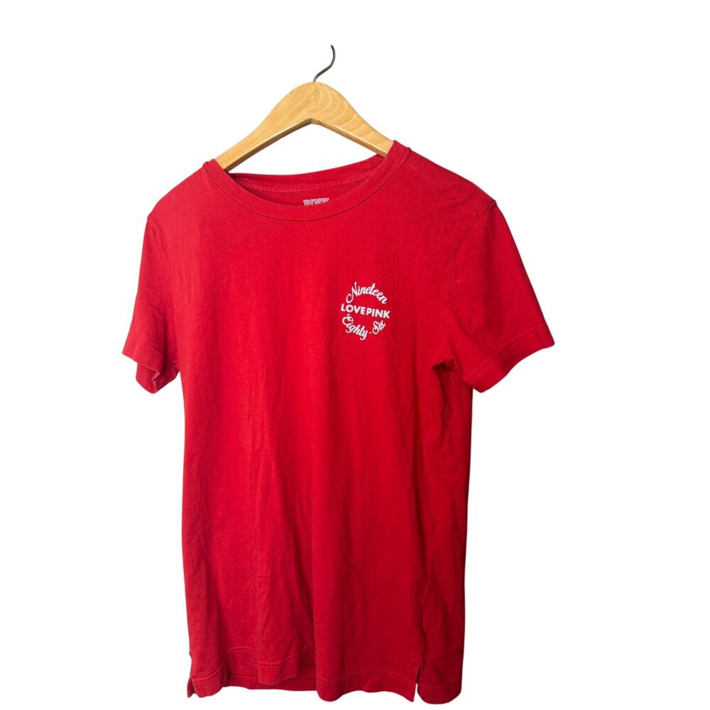 red Victoria's Secret PINK short-sleeve t-shirt with a graphic on the back